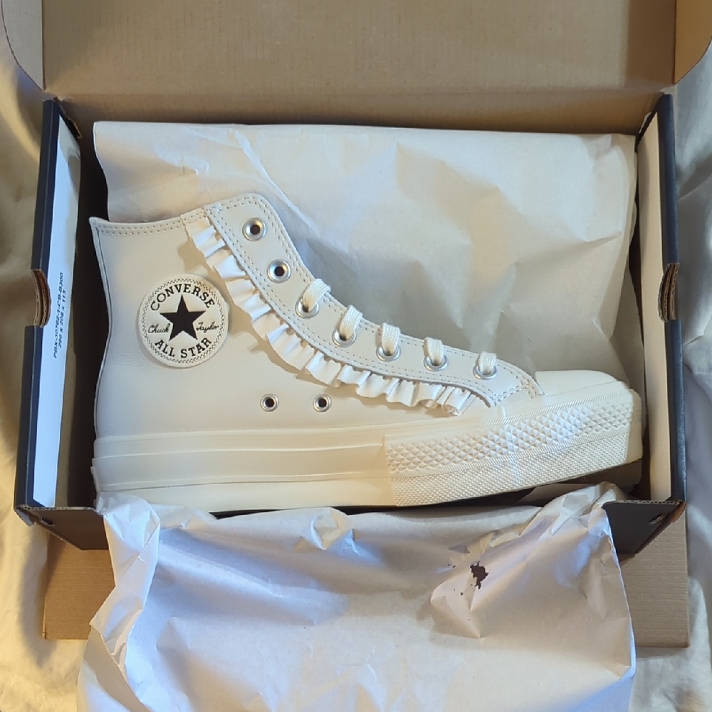 Converse Cream High-Top Sneakers